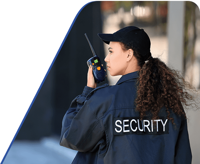 Amtivo (Formerly Certification Europe and EQA) - Manned Guarding - Security guard using a walkie talkie